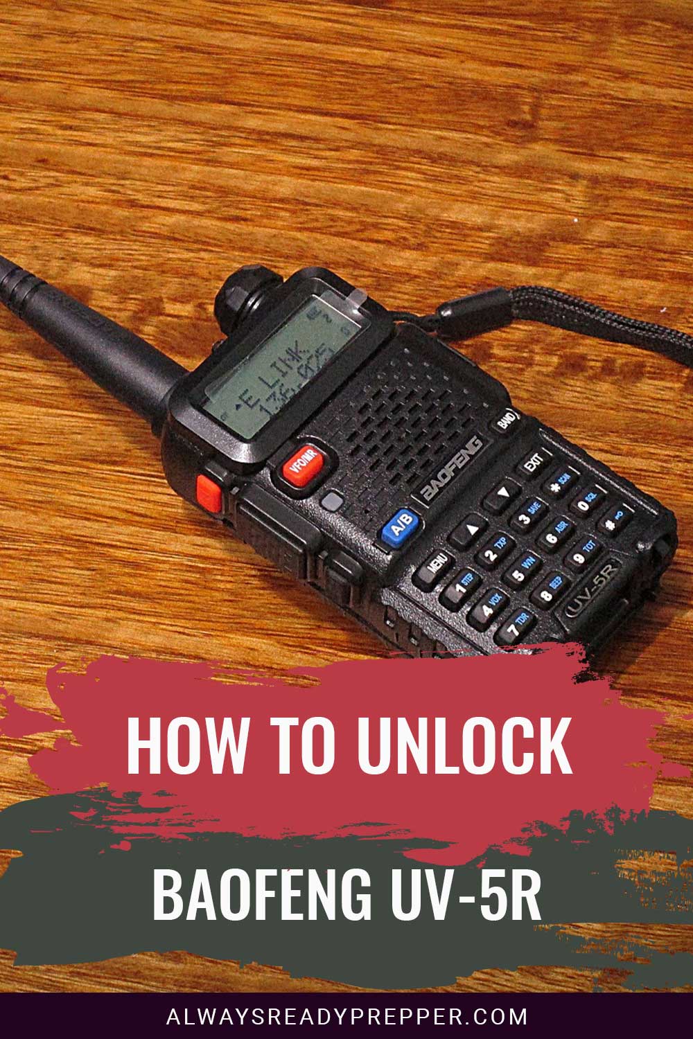 A Baofeng device lying on a wooden surface - How To Unlock Uv-5R?